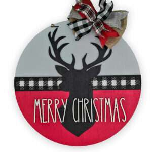 A round custom door sign featuring a black silhouette of a reindeer's head with antlers, set against a red and gray background with a black-and-white plaid stripe. The text "MERRY CHRISTMAS" is in white, and a red, black, and white plaid bow adorns the top. Perfect for your merry christmas deer décor!