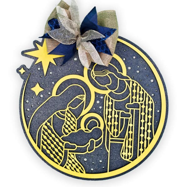 A circular Christmas ornament featuring a golden Nativity scene against a black background. Mary and Joseph gaze at baby Jesus in a manger, with stars and a large star overhead. A decorative bow with blue and beige ribbons adorns the top of this charming custom piece perfect for your holiday décor.